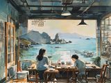 爱妻艺海角海角版画纪念印制课，夫妻共同在版画台上印制海岸风景，油墨香气弥漫工作室